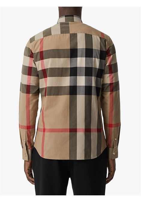 brown button down shirt