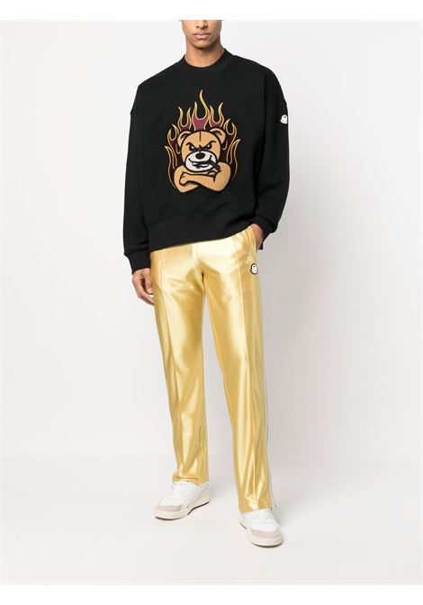 Pantaloni sportivi effetto metallizzato oro con bande bianche laterali MONCLER PALM ANGELS | 8H000-01-M2522135