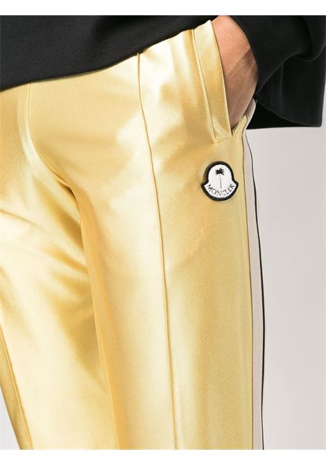 Pantaloni sportivi effetto metallizzato oro con bande bianche laterali MONCLER PALM ANGELS | 8H000-01-M2522135