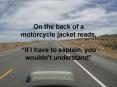 On the back of a motorcycle jacket reads, PowerPoint PPT Presentation