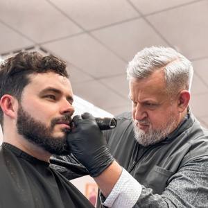 Haircutting beard trim cheek lineup