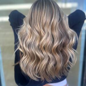 Pin5 blonde wavy back view arms up 1200x1500
