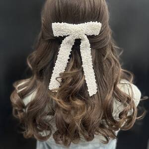 Pin5 brunette curly half up bow back 1200x1500