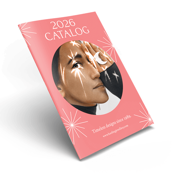 Retail jewelry catalog for 2026 in coral pink with portrait