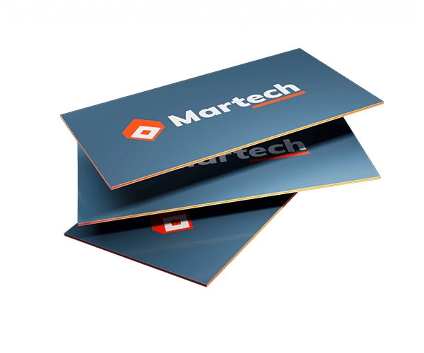 Triple Layer Business Cards Three navy Martech triple layer business cards fanned to show the colored core edge