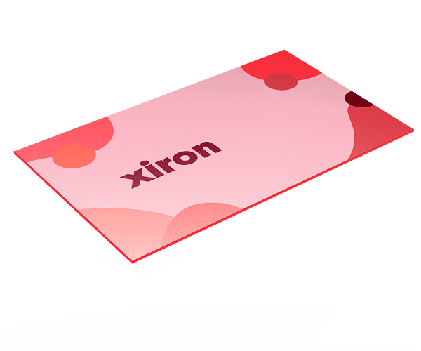 Painted Edge Business Cards Pink Xiron business card with painted red edges, angled to show the colored edge