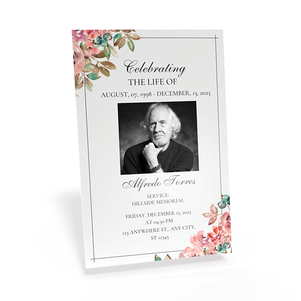 Memorial program card with floral border and portrait photo