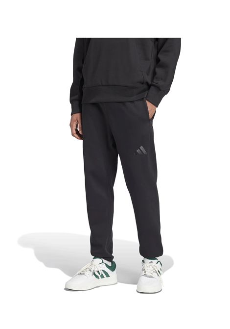 Pantaloni Adidas All SZN Fleece Regular Tapered Nero Uomo ADIDAS CORE | Pantaloni | IX1246-