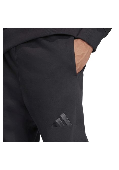 Pantaloni Adidas All SZN Fleece Regular Tapered Nero Uomo ADIDAS CORE | Pantaloni | IX1246-