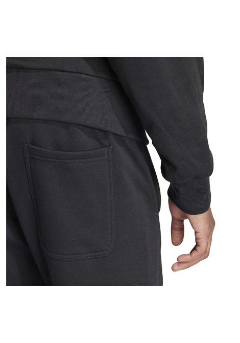 Pantaloni Adidas All SZN Fleece Regular Tapered Nero Uomo ADIDAS CORE | Pantaloni | IX1246-