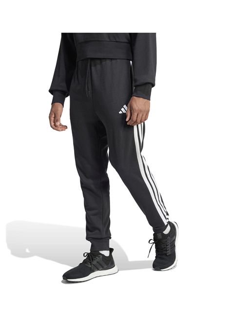 Pantaloni Adidas Essentials French Terry Tapered Cuff 3 Stripes Nero Bianco Uomo ADIDAS CORE | Pantalone | JD1881-