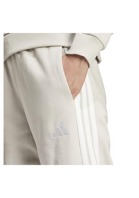 Pantaloni Adidas Essentials 3 Stripes Open Hem French Terry Beige Bianco Donna ADIDAS CORE | Pantaloni | JW7177-