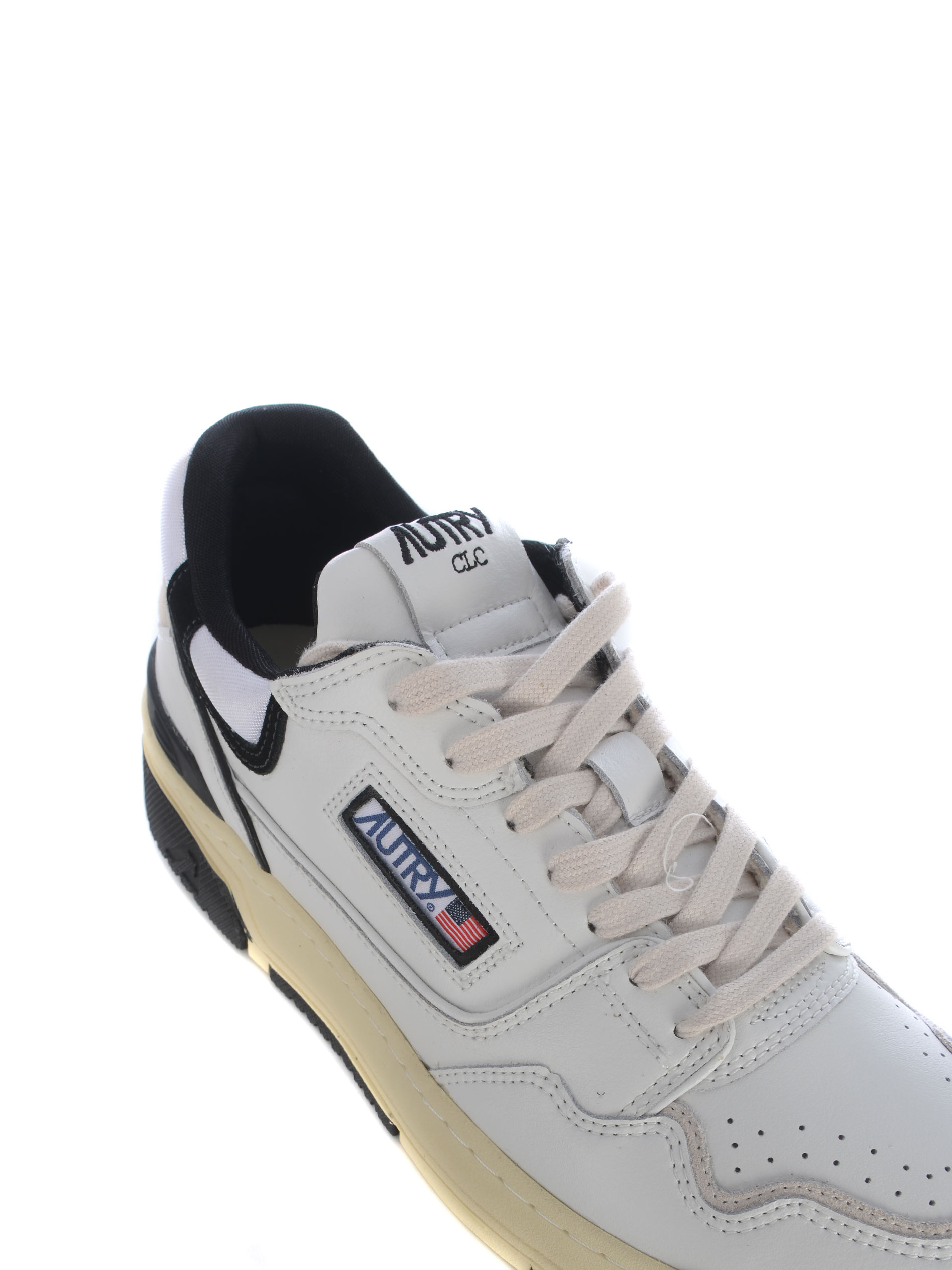 Autry White Low Top Sneakers With Black Details And Logo Patch In Leather And Suede Man In Bianco Nero