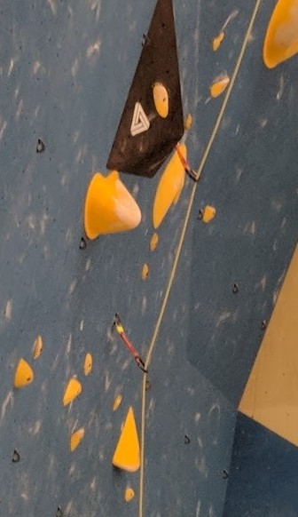 rope clipped in quickdraw