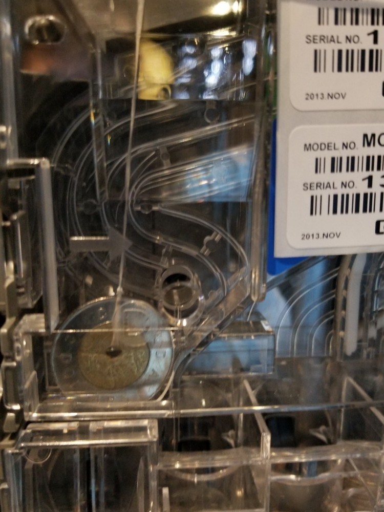 How to hack a vending machine with a coin and string Vending Business