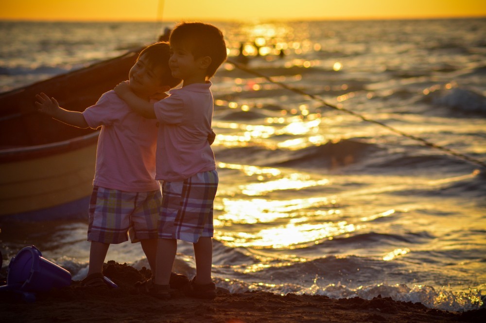 Twin boys at the lake