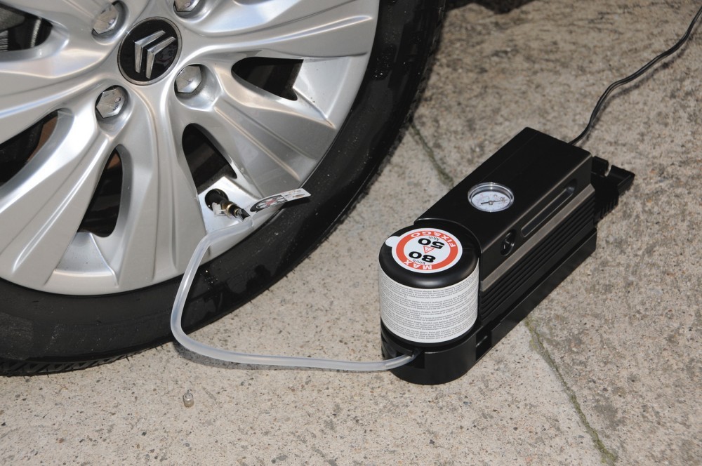 Portable tire inflator