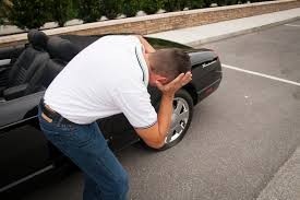 Driver with a flat tire