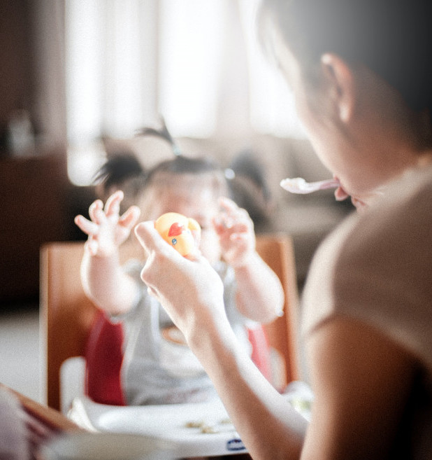 mother feeding baby mother feeding baby