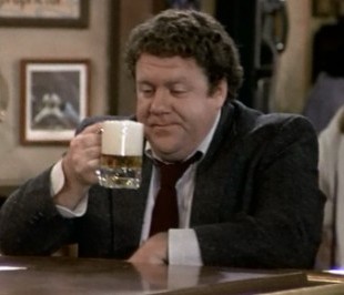Norm from Cheers. Look at the head on that beer, no wonder he looks disappointed. Norm from Cheers. Look at the head on that beer, no wonder he looks disappointed.