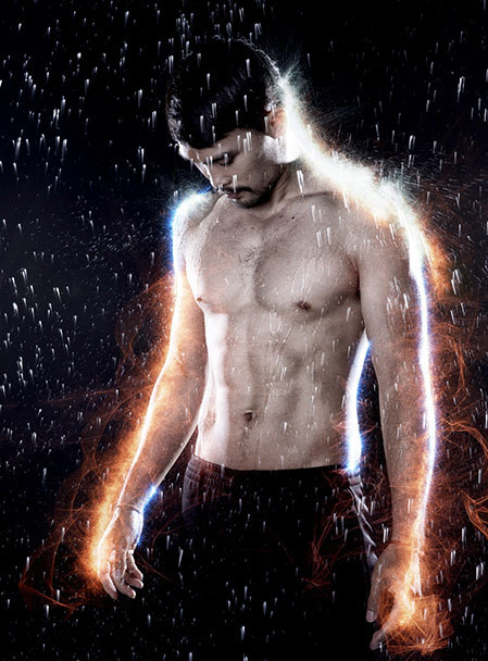 An Athletic Man Standing in the Rain