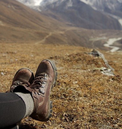 Feet relaxing outside in the mountains