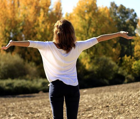 picture of social media woman reaching for the sky