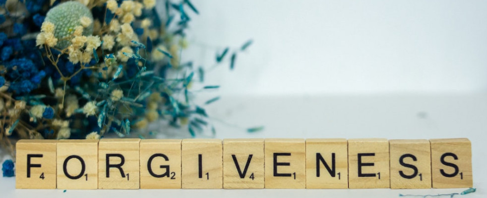 Forgiveness spelled with Scrabble tiles