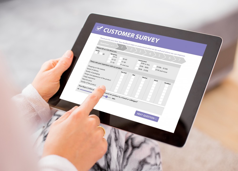 tablet displaying a customer survey tablet displaying a customer survey