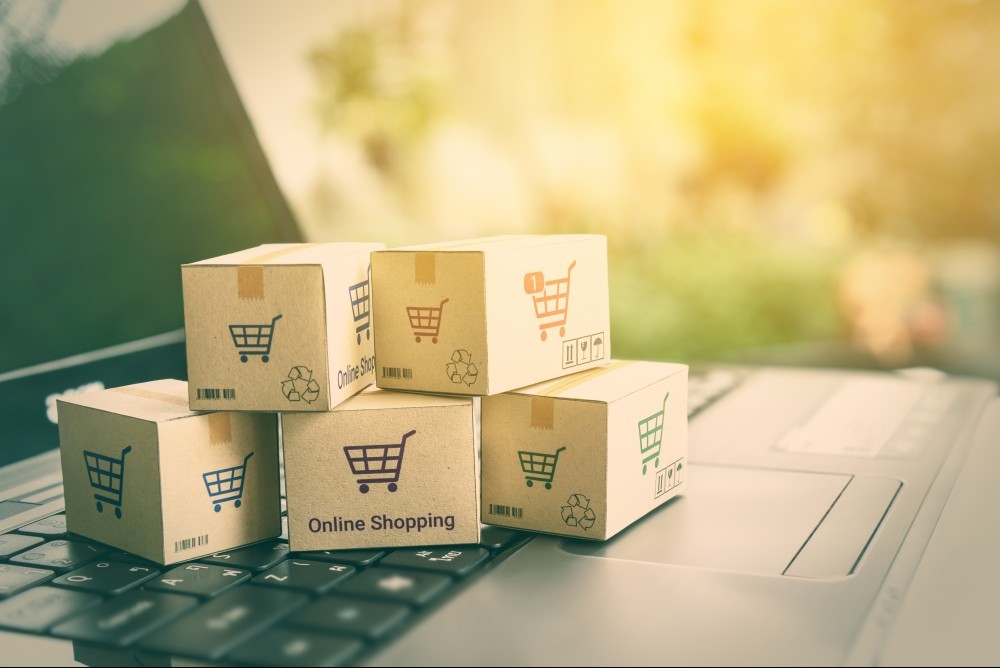 online shopping boxes and a laptop online shopping boxes and a laptop
