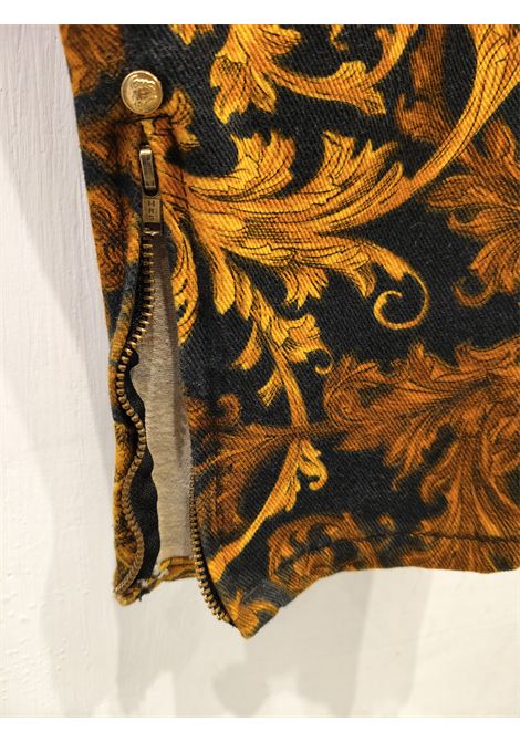 1990s Versace Jeans by Gianni Versace black and gold baroque pants size 32 denim Gianni Versace Pre-Owned | PANT BAROCCOBAR