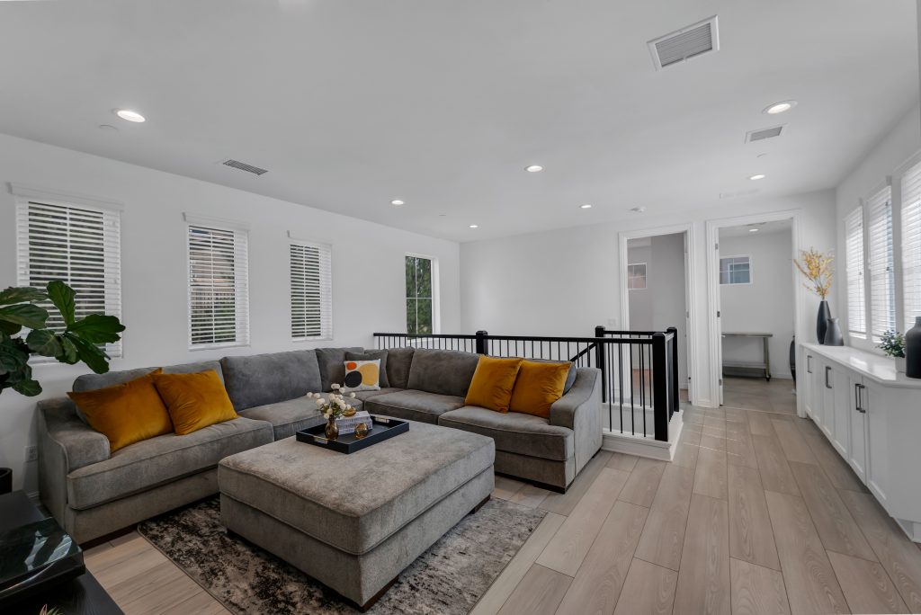 Professionally staged living room in Santa Clarita home relisting after previously failing to sell