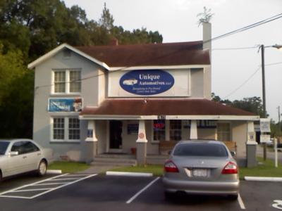 Unique Automotives Logo