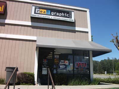 The Real Graphic Source Logo