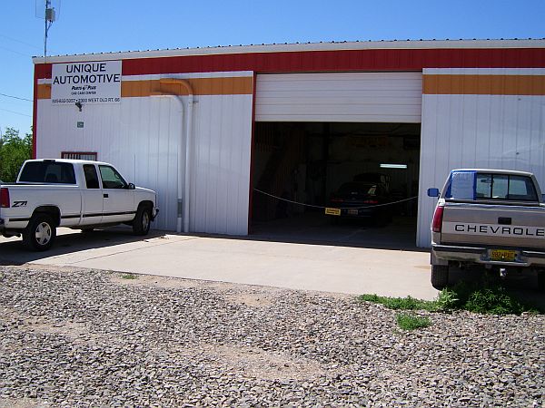 Unique Automotive Service Center Logo