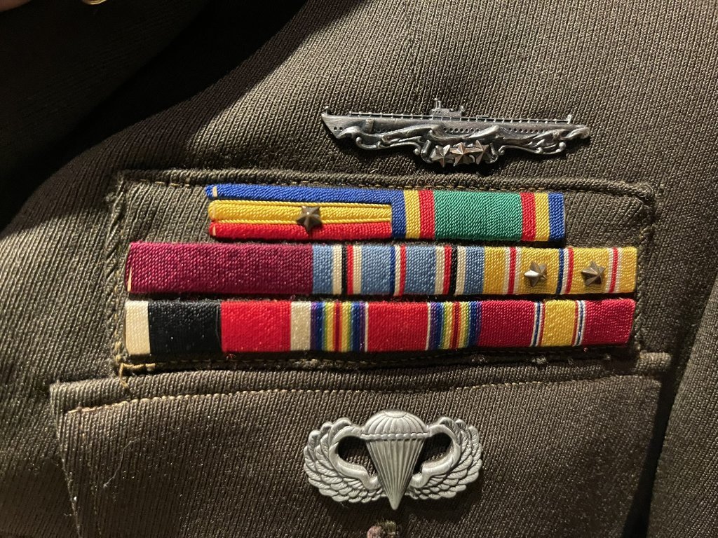 Why Is a Navy Submarine Combat Badge on an Army Colonel’s Uniform?*