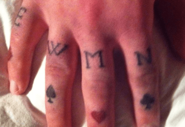 Knuckle tattoo.