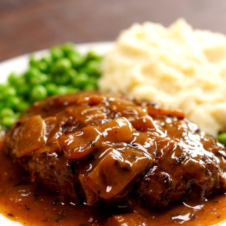 Salisbury Steak brown onion gravy close-up.