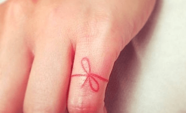 Why People Are in Love With Red String Tattoos