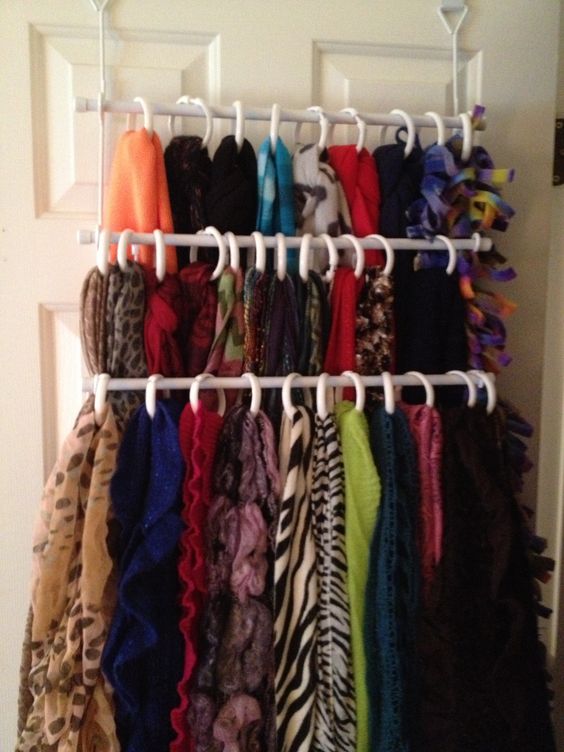 Organizing scarves with towel bars.