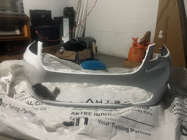 2012 Ford Taurus Front Bumper. White Platinum Tricoat