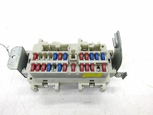 2003-2004 INFINITI G35 COUPE OEM LEFT FRONT UNDER DASH FOOT FUSE RELAY BOX