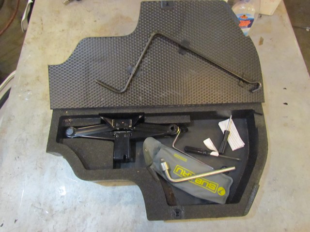 2001 Subaru Forester LH Driver Side Spare Spacer With Tools