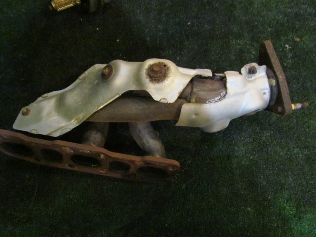 2012 M37x LH Driver Exhaust Manifold