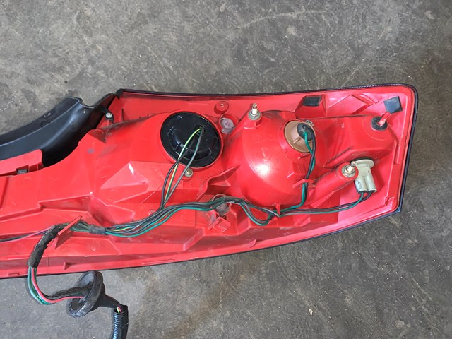 2005-2007 Infiniti G35 Coupe Painted/Smoked LH Driver Tail Light OEM