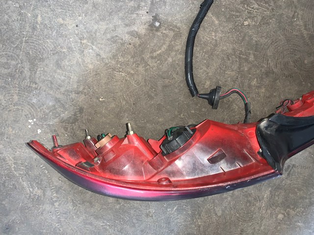 2005-2007 Infiniti G35 Coupe Painted/Smoked LH Driver Tail Light OEM
