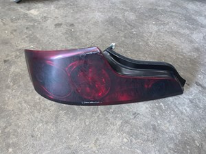 2005-2007 Infiniti G35 Coupe Painted/Smoked LH Driver Tail Light OEM