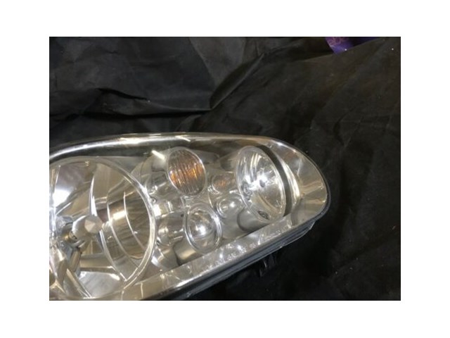 97/06 TYC Headlight RH Passenger Side VW Golf 20-6473RS