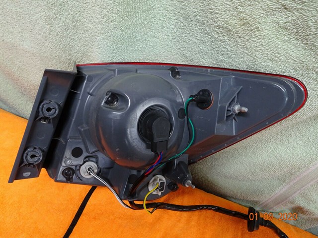 CRUZE  2011-2015 TAILLIGHT DRIVERS SIDE W/BULBS OEM  USED PART# 9454O776