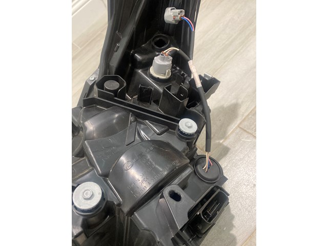 16-19 Lexus RX 350/450h Headlight passenger side.  1EJ 945 250-02